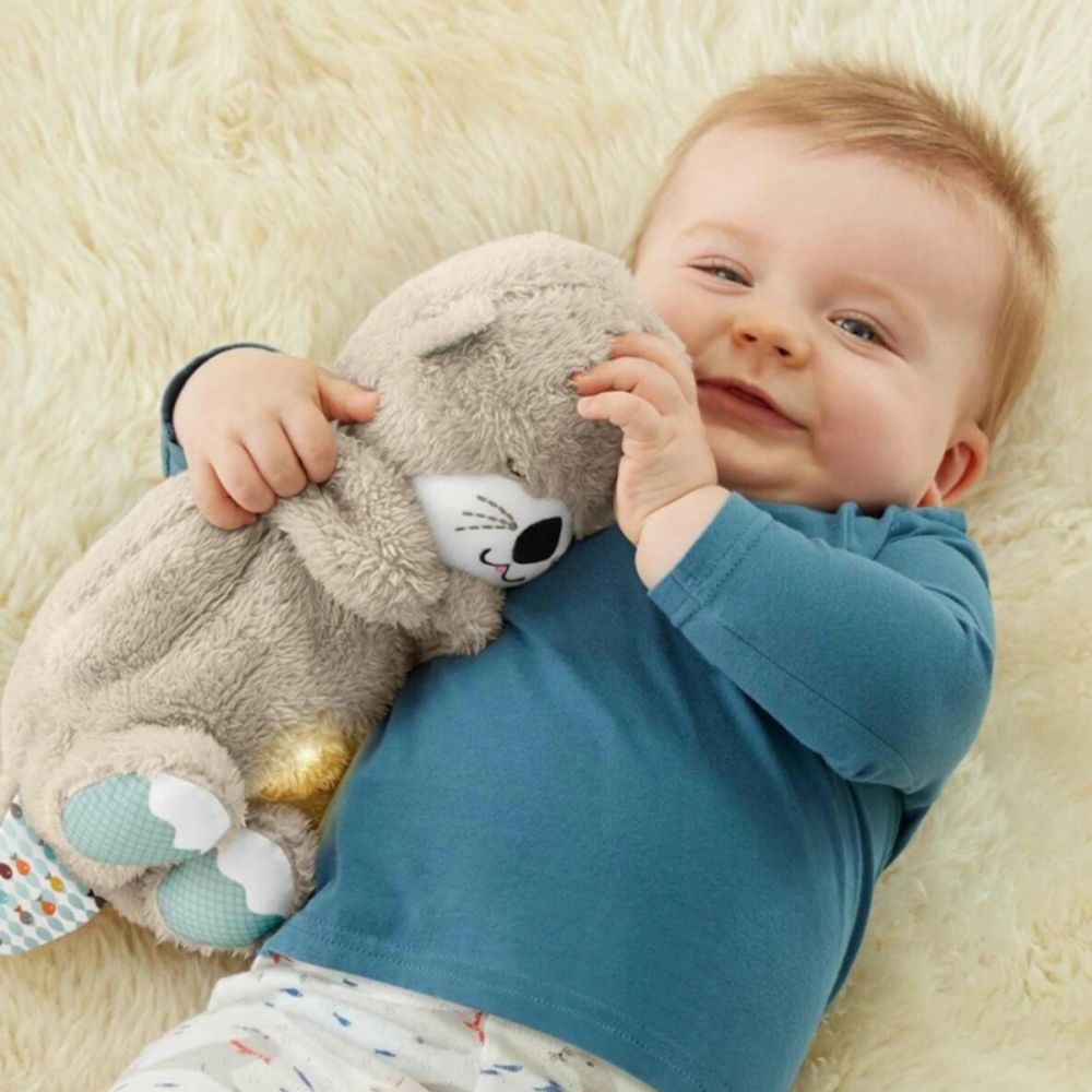 Baby sleep aid with calming music and soft glowing light
