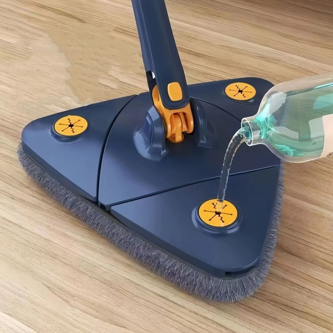Triangle mop reaching under low bed for deep clean