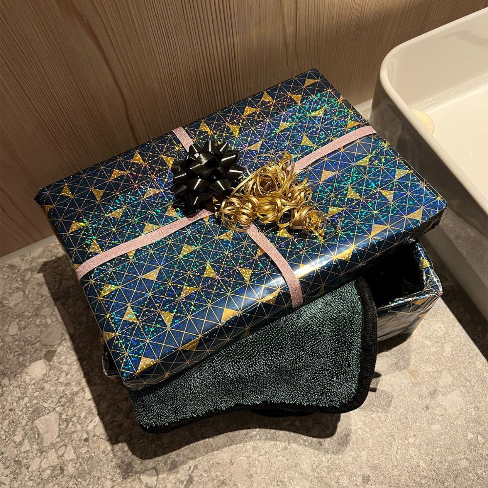 Quick dry towel preventing limescale build-up on bathroom surfaces