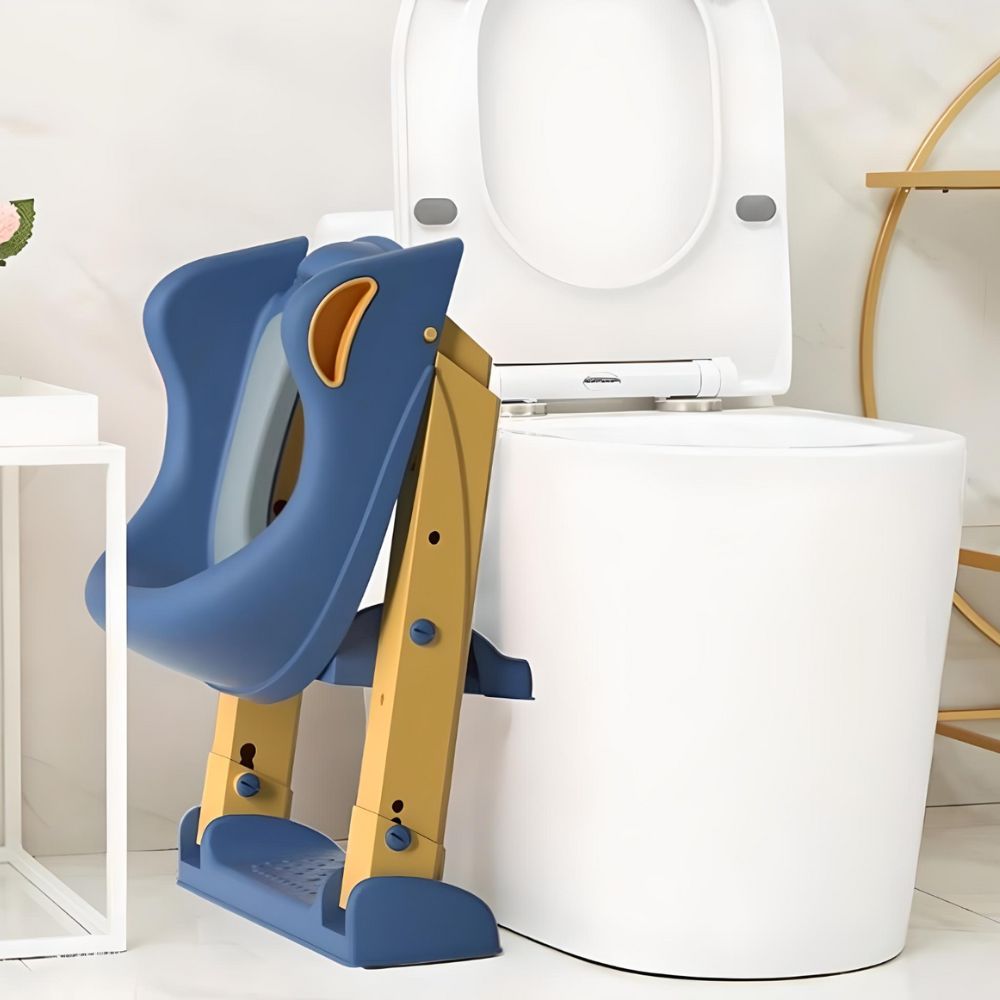 Grey and white potty trainer ladder folded next to toilet