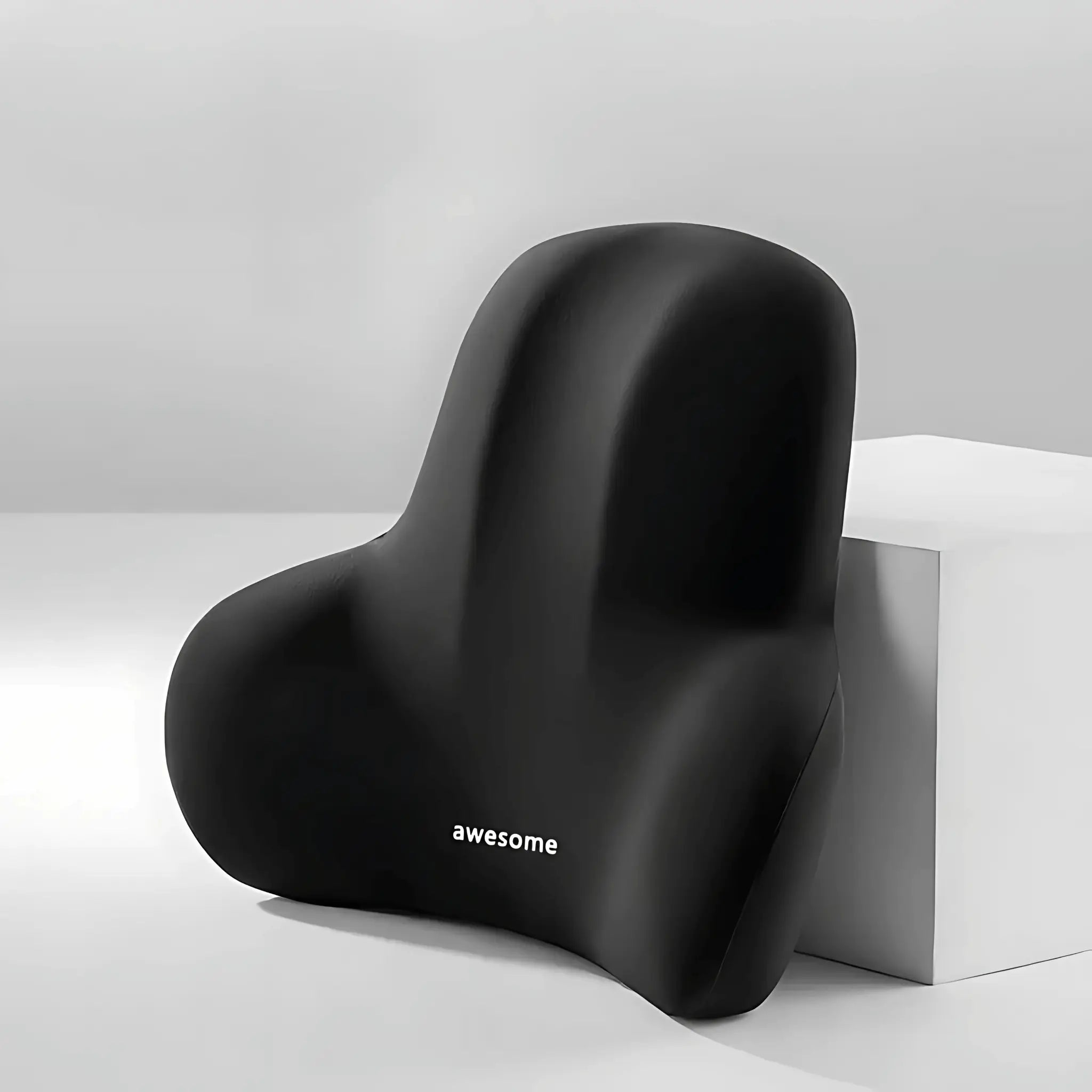 LumbarPro cushion with removable cover unzipped showing memory foam core inside