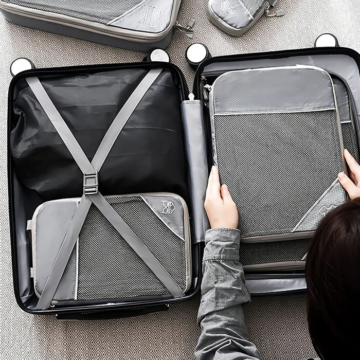 Different sizes of compression packing cubes with labels