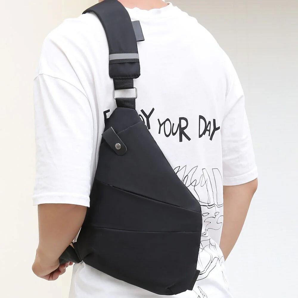 Lightweight travel sling bag worn across chest for safety