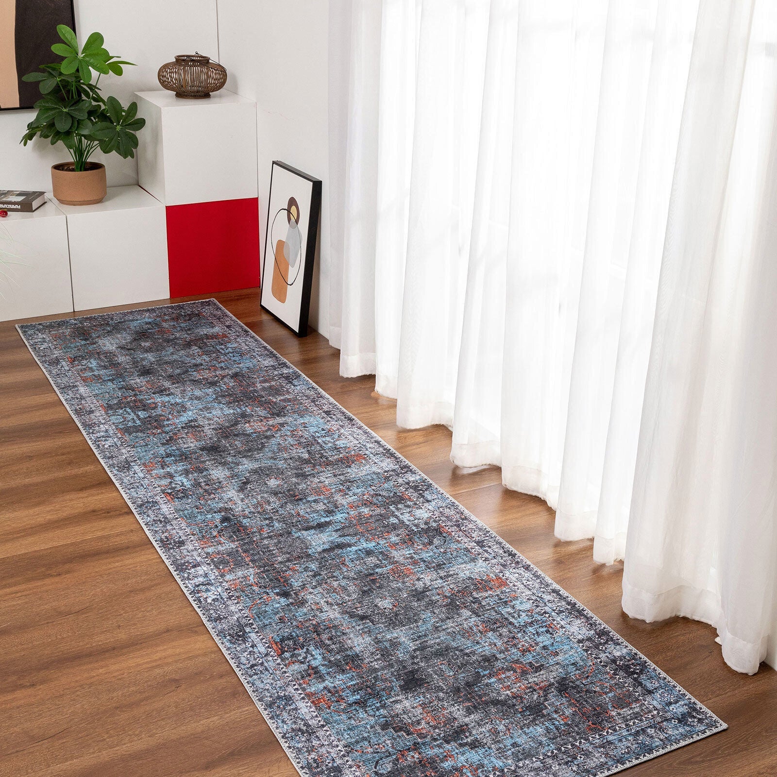 LuxeLounge area rug protecting living room floor