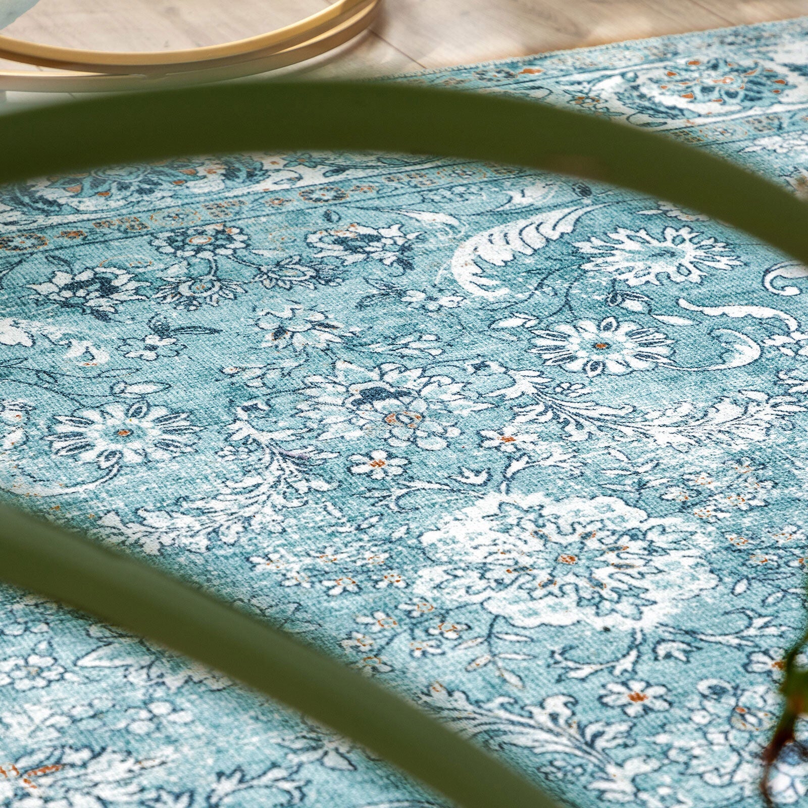 Soft washable rug styled under coffee table