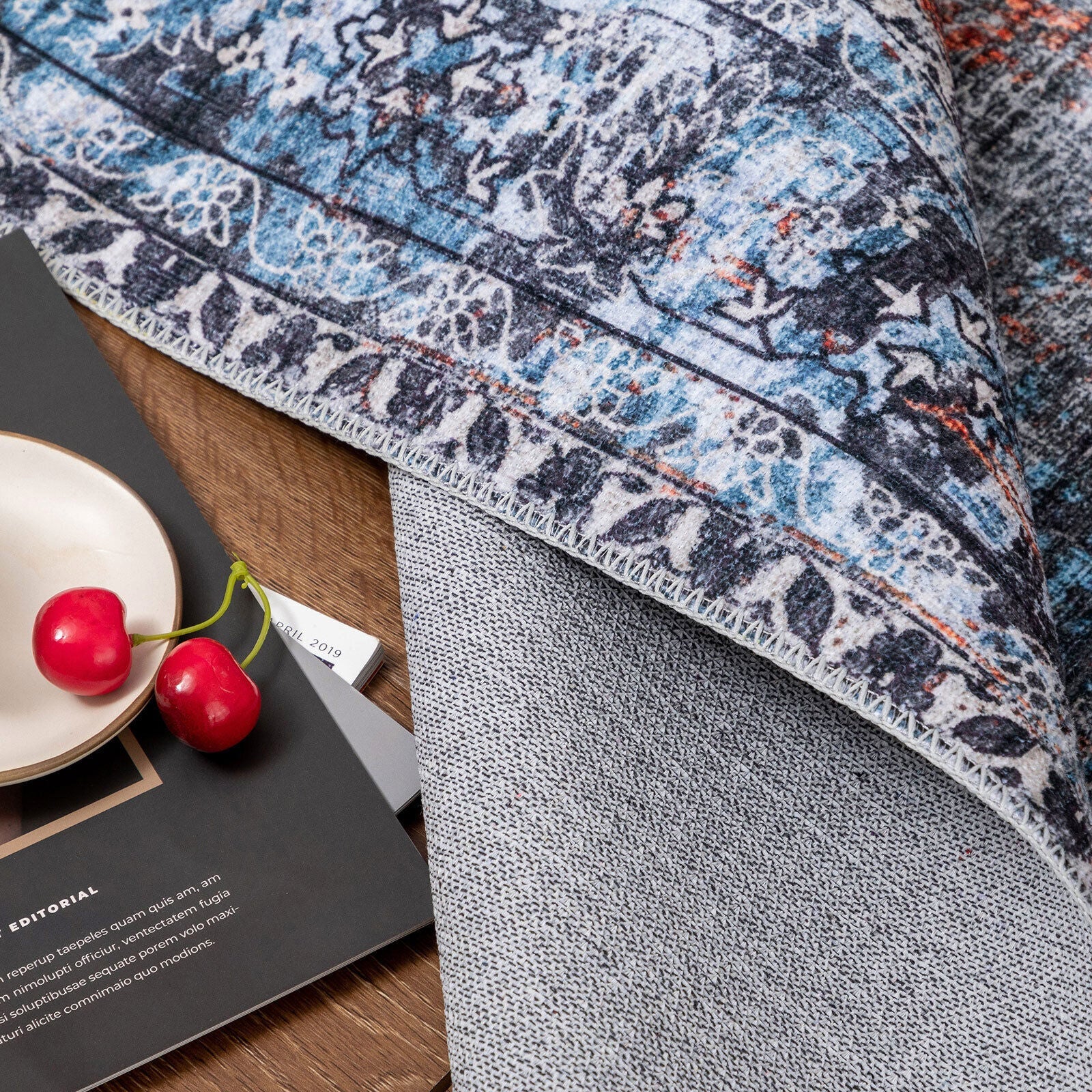 Plush washable rug with spill-resistant surface