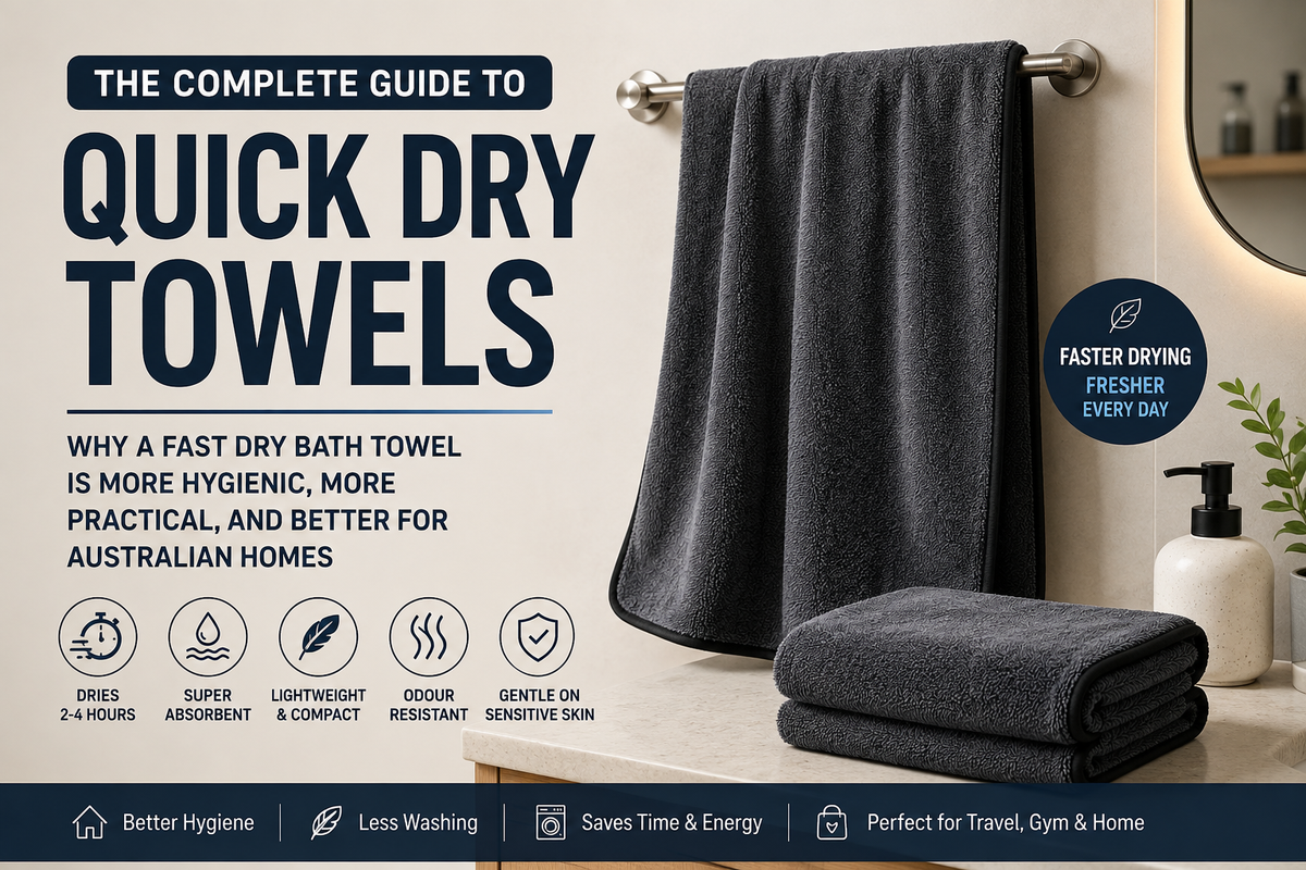 Woman patting dry with a soft quick dry towel after a shower in a bright modern Australian bathroom