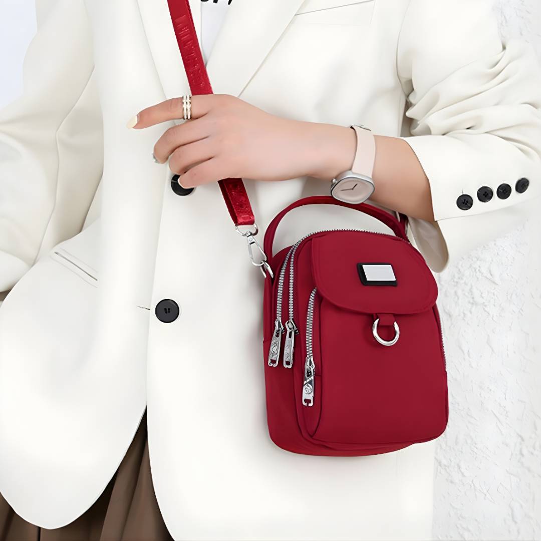 Women wearing chic waterproof crossbody bag in rain