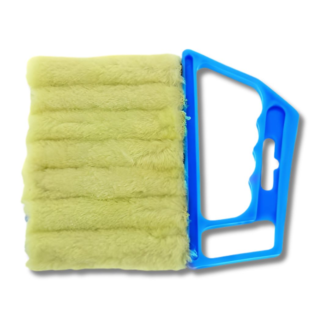 ProSwipe microfiber cleaning tool removing allergens from dusty window blinds
