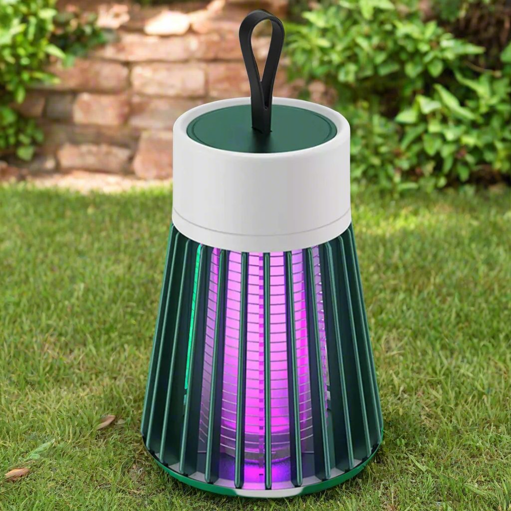 Hanging mosquito zapper in backyard at night


