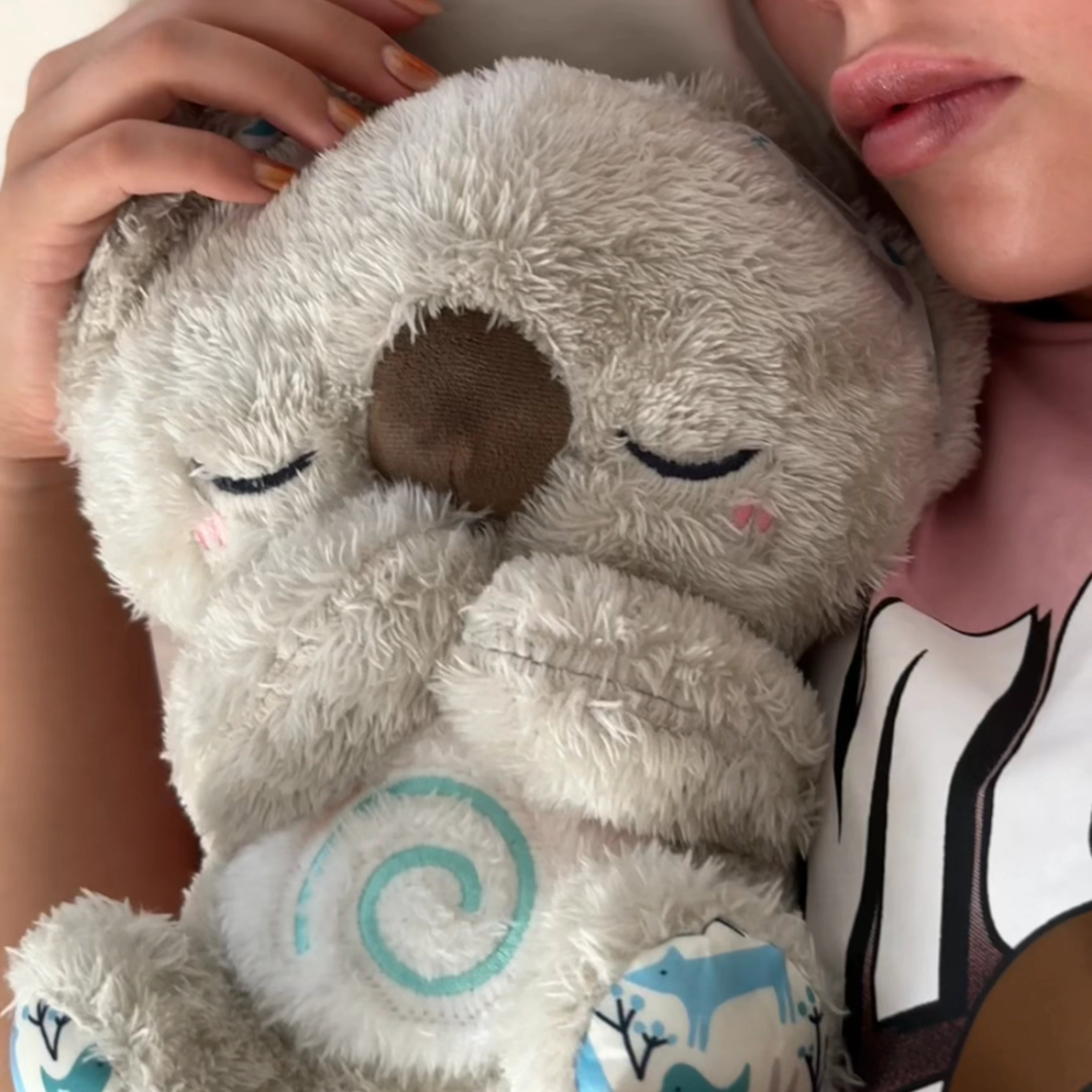 Soft plush sleep companion with relaxing music and white noise modes

