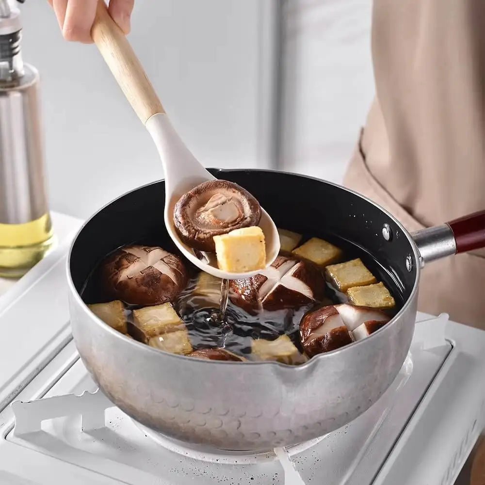 Dishwasher safe silicone cooking utensils with heat resistant construction