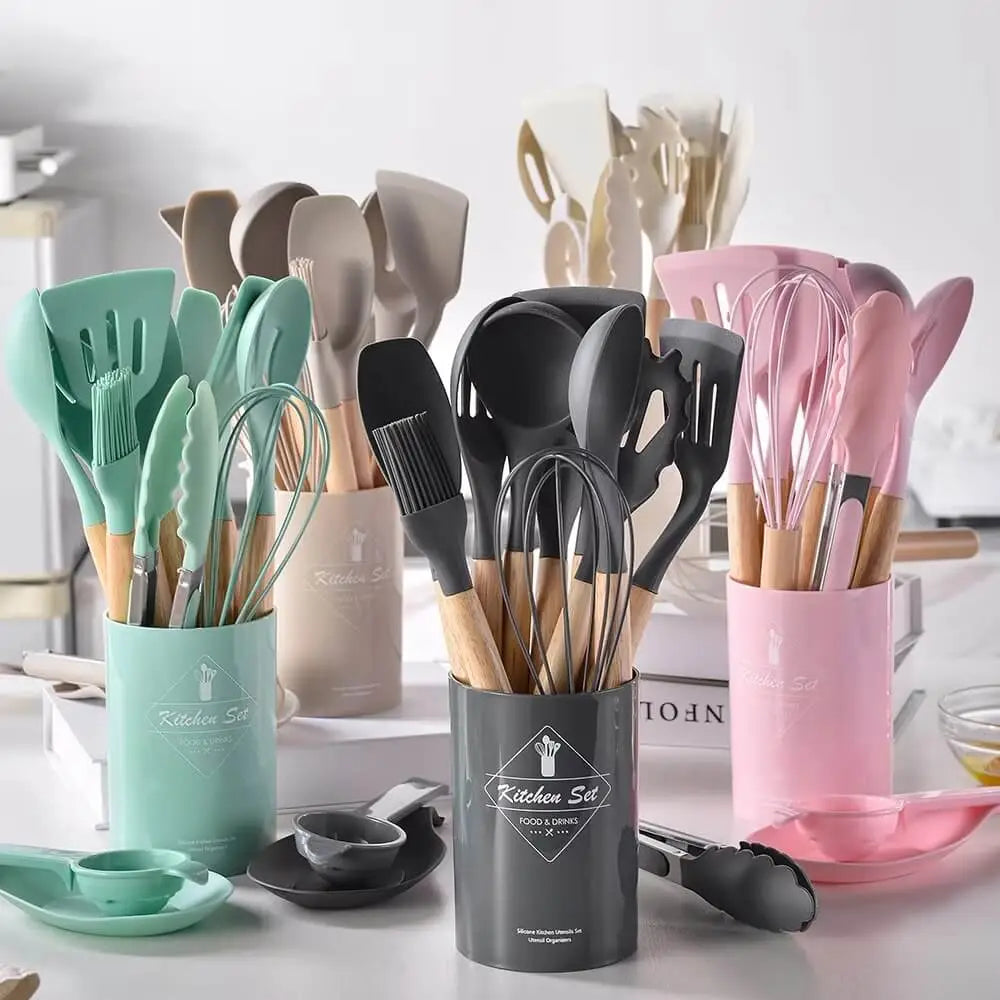 Kitchen utensil storage holder with 12 silicone tools organised on countertop