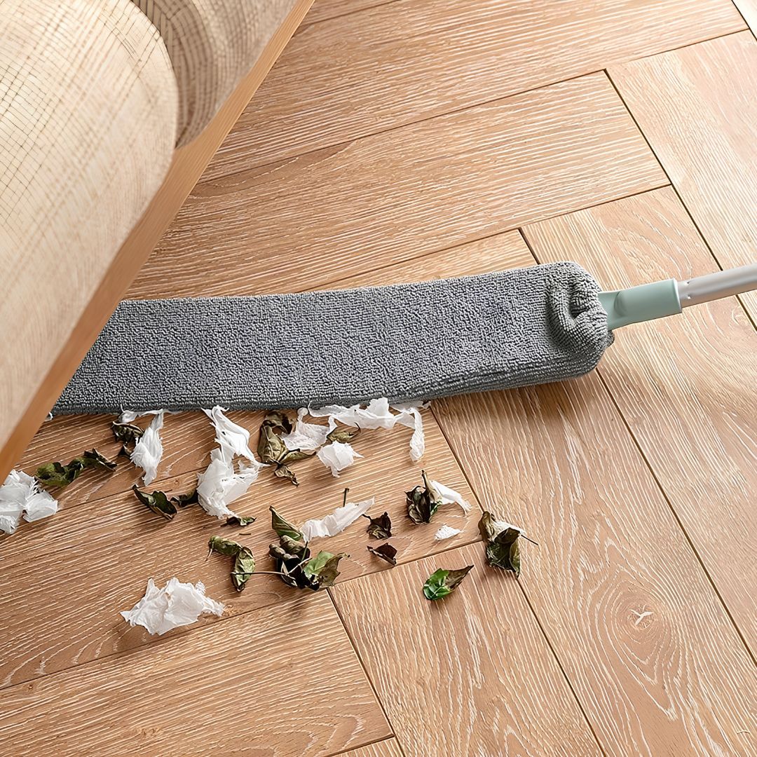 Microfiber gap cleaning tool with bendable head reaching behind kitchen appliances