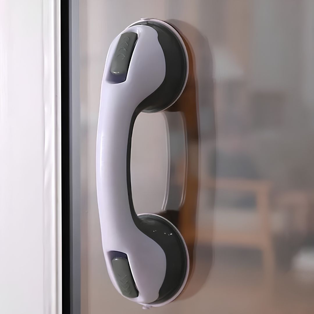 ProGrip grab handle providing balance support beside bathtub on smooth tile surface