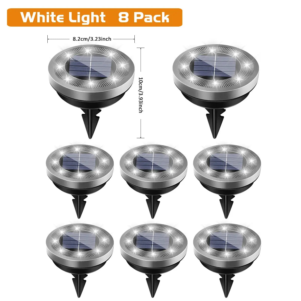 Solar powered ground lights with spike pushed into soil on garden path