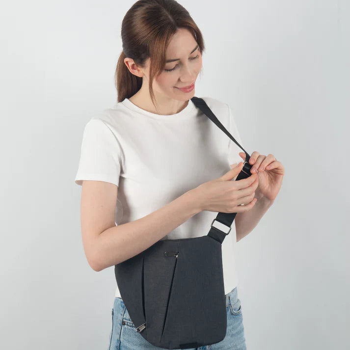 Travel crossbody bag with hidden pockets and anti theft design